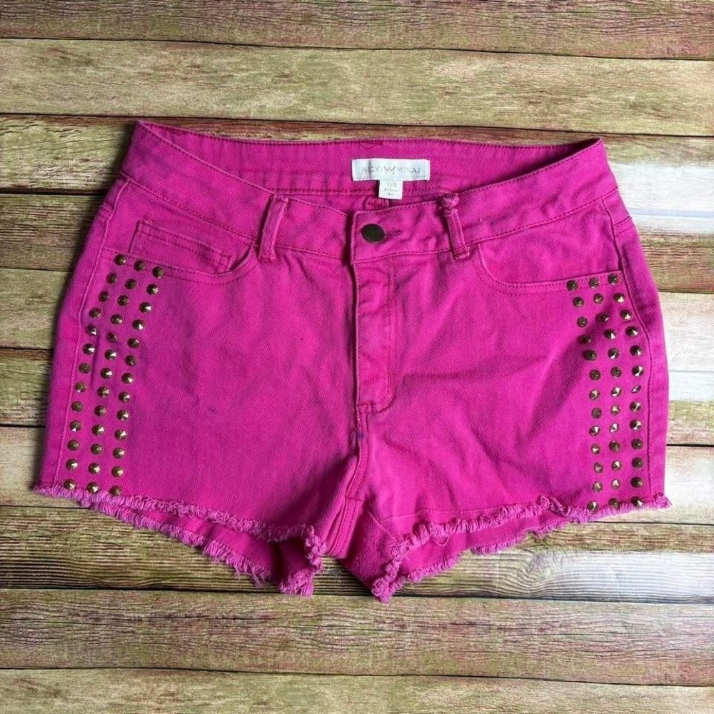 Y2K pink studded cutoff shorts w/ frayed hem by Niki Minaj. Flaw in pic